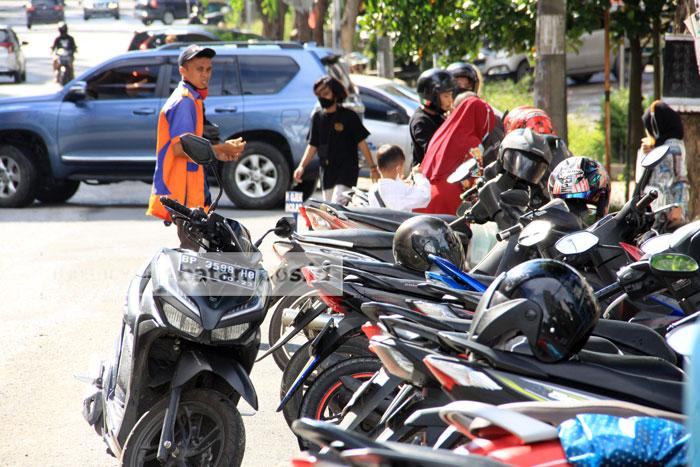 HORE! Parkir di Pasar Tradisional Pekanbaru Kini Cuma Rp1.000