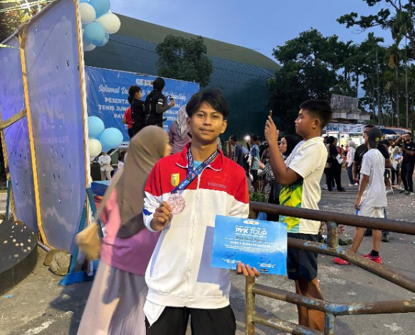 Rezki Palepi Harumkan Kuansing, Sabet Juara III Kejurnas Tenis Ganda Junior